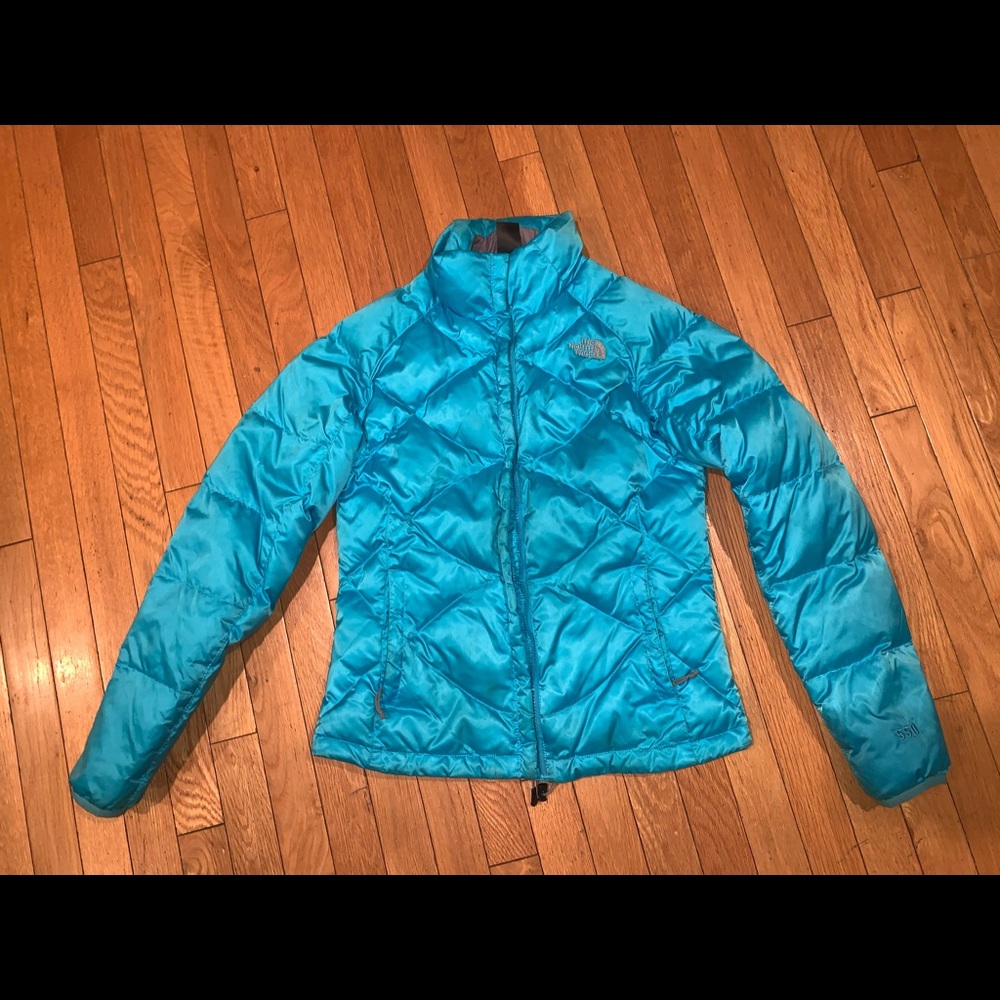 The North Face blue puffy coat